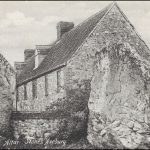 Black and white printed postcard of stones of Avebury Stone Circle, Wiltshire